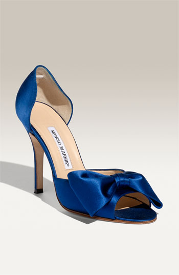 How about shoes Blue wedding shoes are a fun way to bring a pop of color to